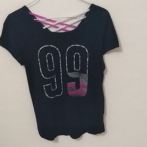 Black shirt with a 99 in the front